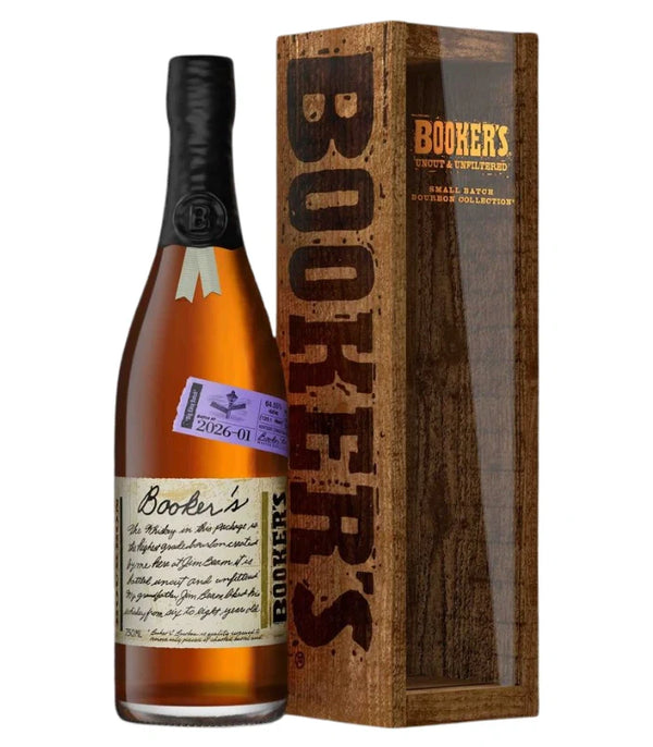 Booker's Uncut & Unfiltered Small Batch Bourbon bottle with dark amber liquid and black wax seal displayed beside its rustic wooden box with an embossed logo and a purple batch 2026-01 label visible