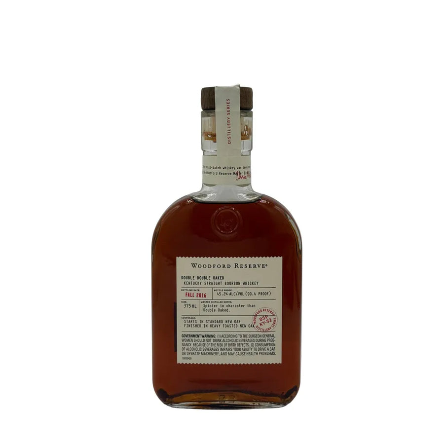 Woodford Reserve whiskey bottle on a white background