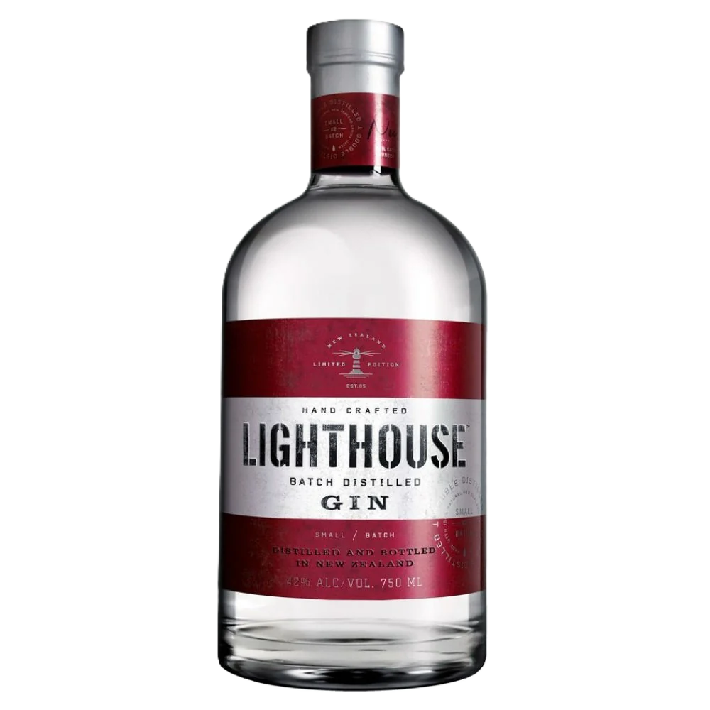 Product photography of a Lighthouse Gin bottle, a clear glass bottle with a silver cap and rustic red label featuring a lighthouse icon and white "LIGHTHOUSE Batch Distilled Gin" text, a limited edition spirit distilled and bottled in New Zealand at 42% ALC/VOL 750 ML