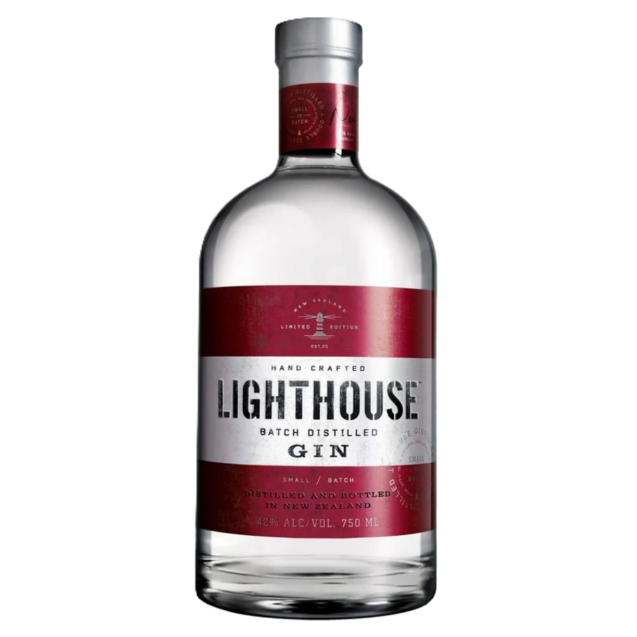 Product photography of a Lighthouse Gin bottle, a clear glass bottle with a silver cap and rustic red label featuring a lighthouse icon and white "LIGHTHOUSE Batch Distilled Gin" text, a limited edition spirit distilled and bottled in New Zealand at 42% ALC/VOL 750 ML