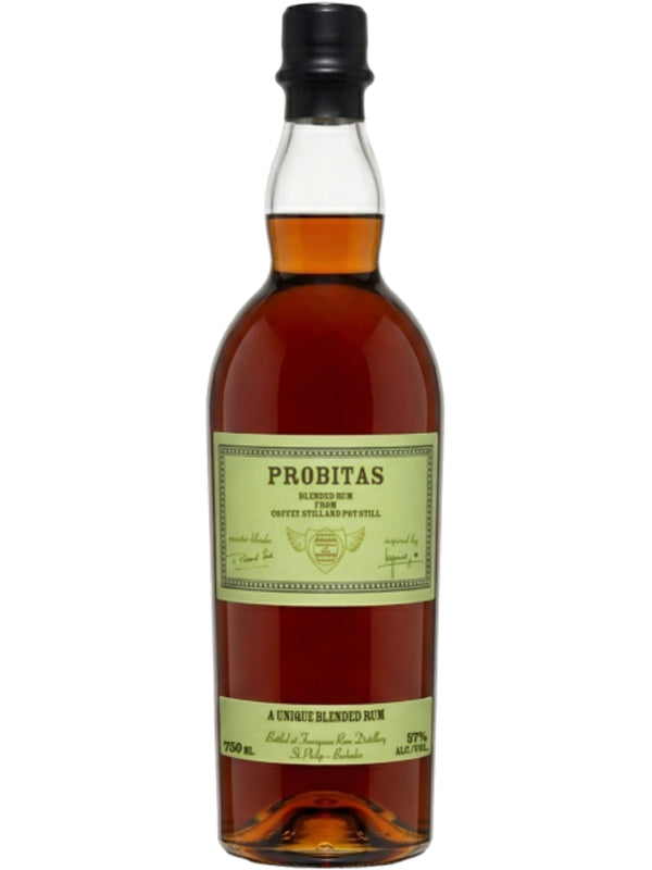A bottle of Probitas Blended Rum from Foursquare Rum Distillery St Philip Barbados featuring deep amber liquid a light green label with dark green text a winged crest emblem and "Coffey Still and Pot Still" designation at 57% ABV