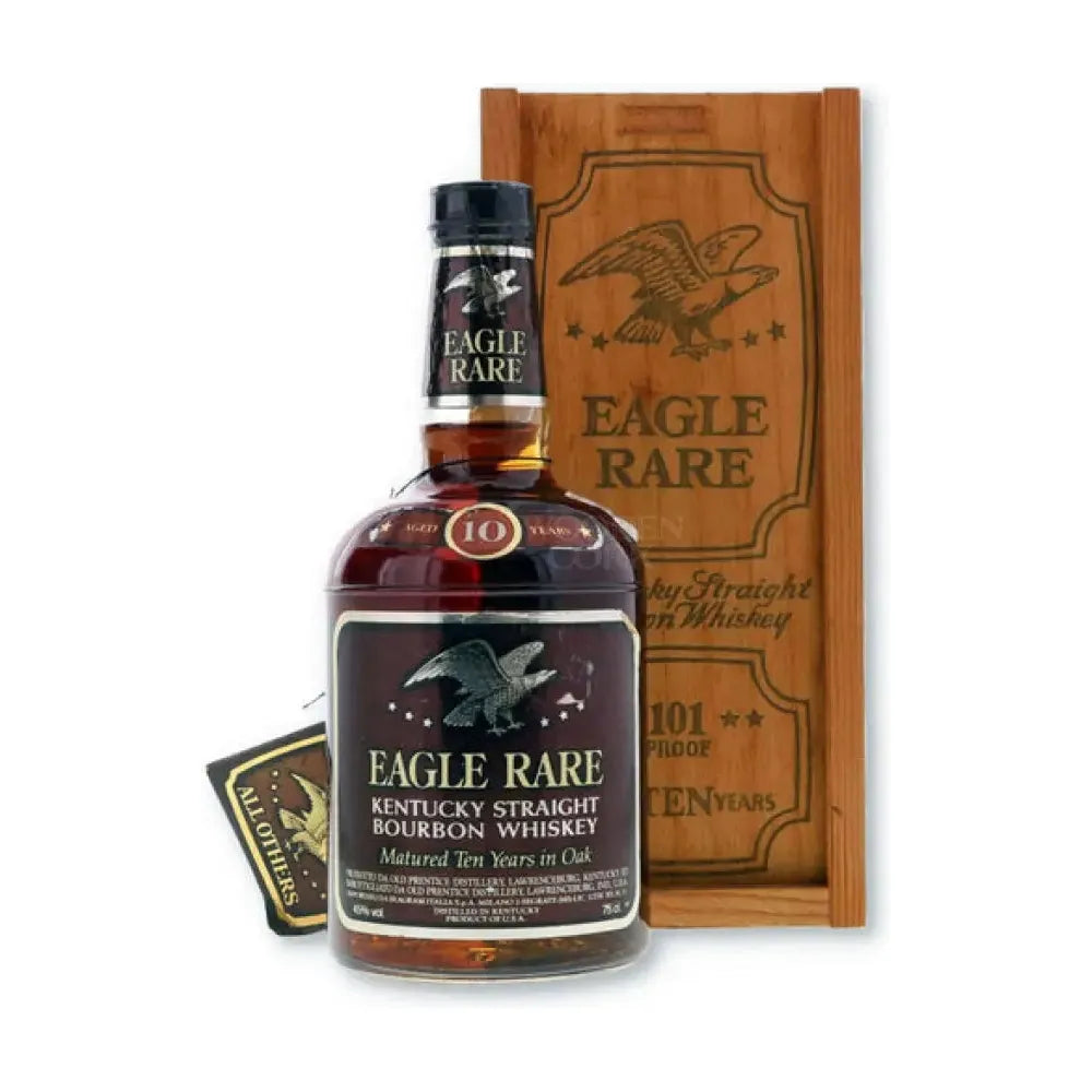 Eagle Rare Kentucky Straight Bourbon Whiskey bottle and wooden box on a white background