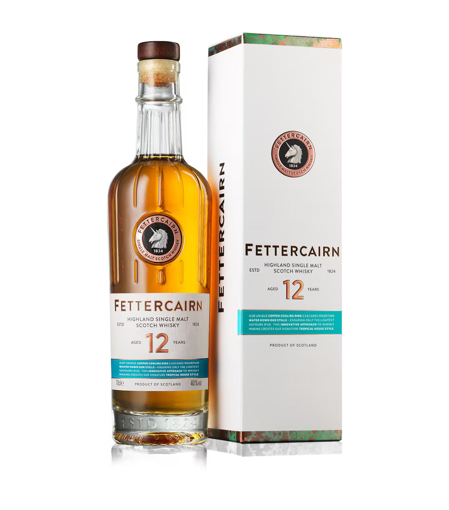 Fettercairn 12-year-old whisky bottle and box on a white background