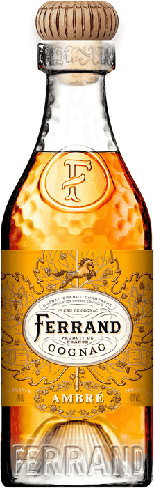 Product photography of a Ferrand 1er Cru de Cognac Ambré bottle from France, showcasing rich amber liquid in a textured glass bottle, an ornate gold label with a leaping horse, and a distinctive ribbed wooden cork