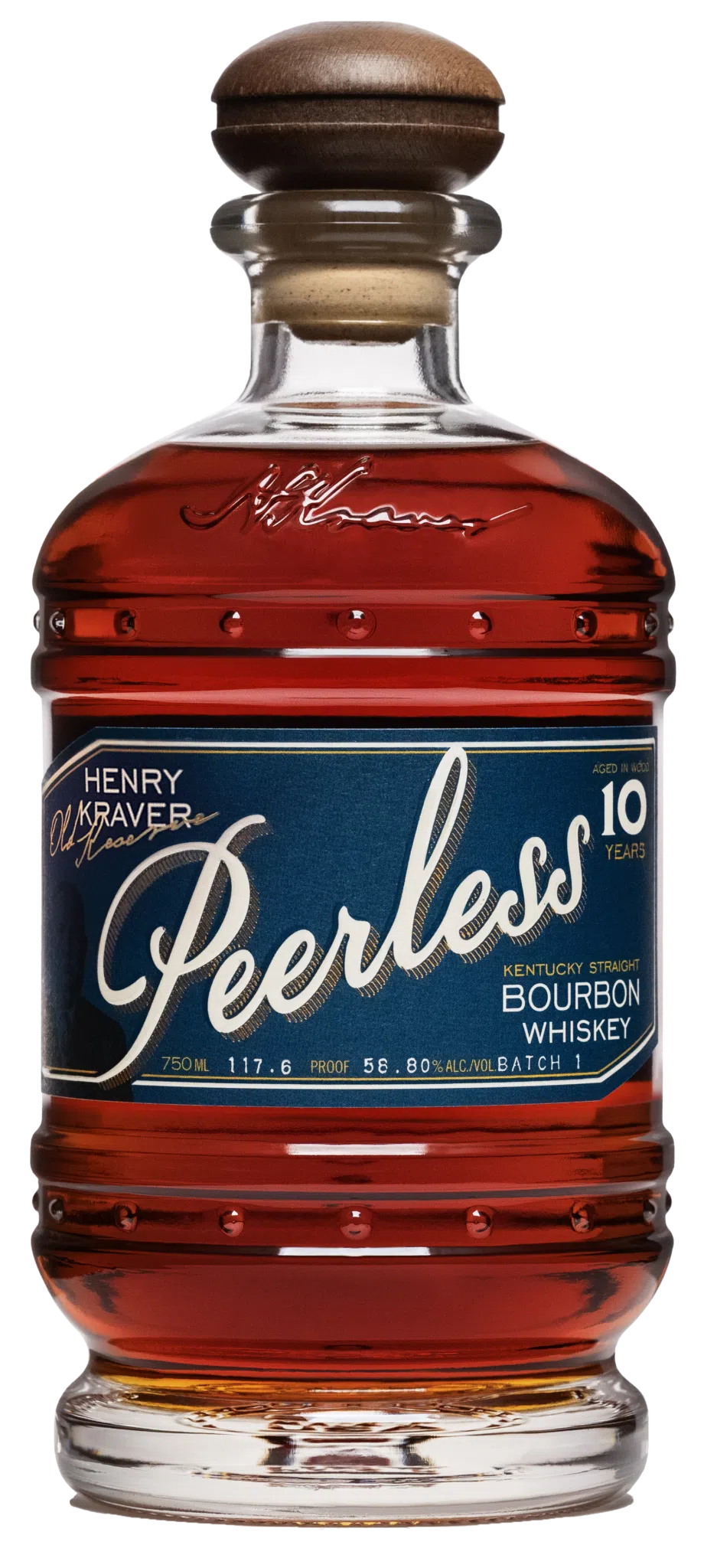 Photograph of a Peerless 10 Year Kentucky Straight Bourbon Whiskey bottle, showcasing its rich amber liquid, dark blue label with elegant gold and white script, and unique bottle design featuring a dark wooden cork and embossed signature on the glass