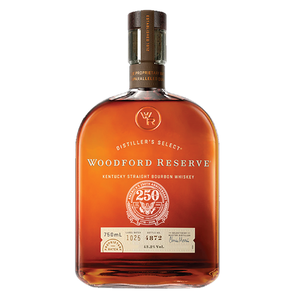 Product photography of a Woodford Reserve Distiller's Select Kentucky Straight Bourbon Whiskey in an amber bottle, prominently displaying an "Established 1812" neck label and an "America's 250th Anniversary 1776-2026" eagle seal