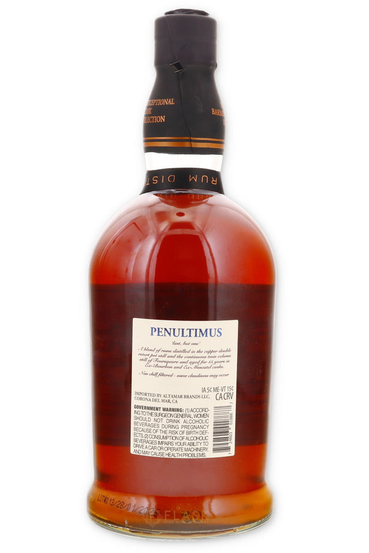 Product photography of a Penultimus rum bottle featuring dark amber liquid, a black neck with gold Exceptional Cask Selection text, and a white label detailing it as a 15-year-old Foursquare distillation